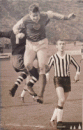 František Huml (vpravo) – v souboji s útočníkem Dukly Praha Rődrem.  Zápas 1. ligy Dukla Praha – Spartak Hradec Králové – 25.3.1966